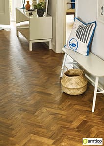 Amtico Spacia parquet wood effect flooring in a residential hallway setting.