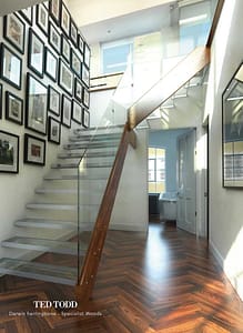 Ted Todd Specialist Woods Darwin Herringbone flooring in a modern style residential hallway with an open stairway.