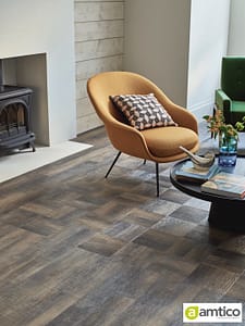 Amtico Signature dark grey Dockland Oak effect flooring with a block parquet pattern in a contemporary living room.