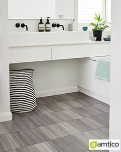 Amtico Spacia grey Mirus Feather flooring with a square plank pattern in a traditional style bathroom.