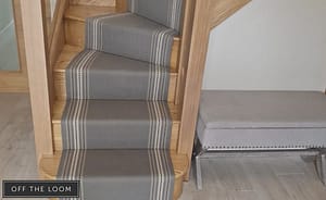 Off The Loom Brampton Seaweed stair carpet on a curved wooden staircase.