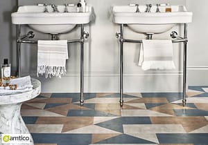 Amtico Signature tile effect flooring in a harlequin colour in a bathroom with duel wash basins.