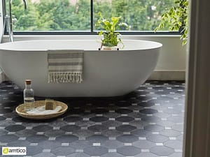 Amtico Signature dark grey Keystone Kura flooring with a mosaic pattern in a traditional bathroom.